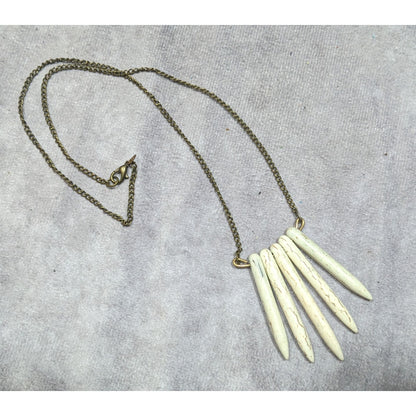 Howlite Graduated Spike White And Gold Tone Pendant Necklace