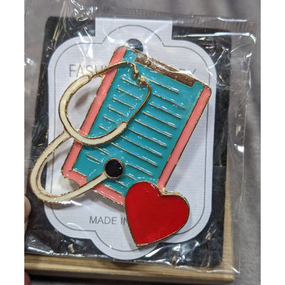 Nurse-Themed Enamel Pin With Clipboard Stethoscope & Heart Design