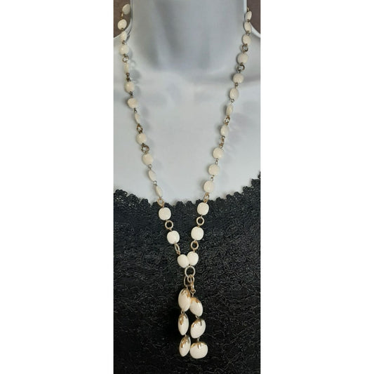 White Seed Beaded Necklace With Tassel And Silver Tone Accents