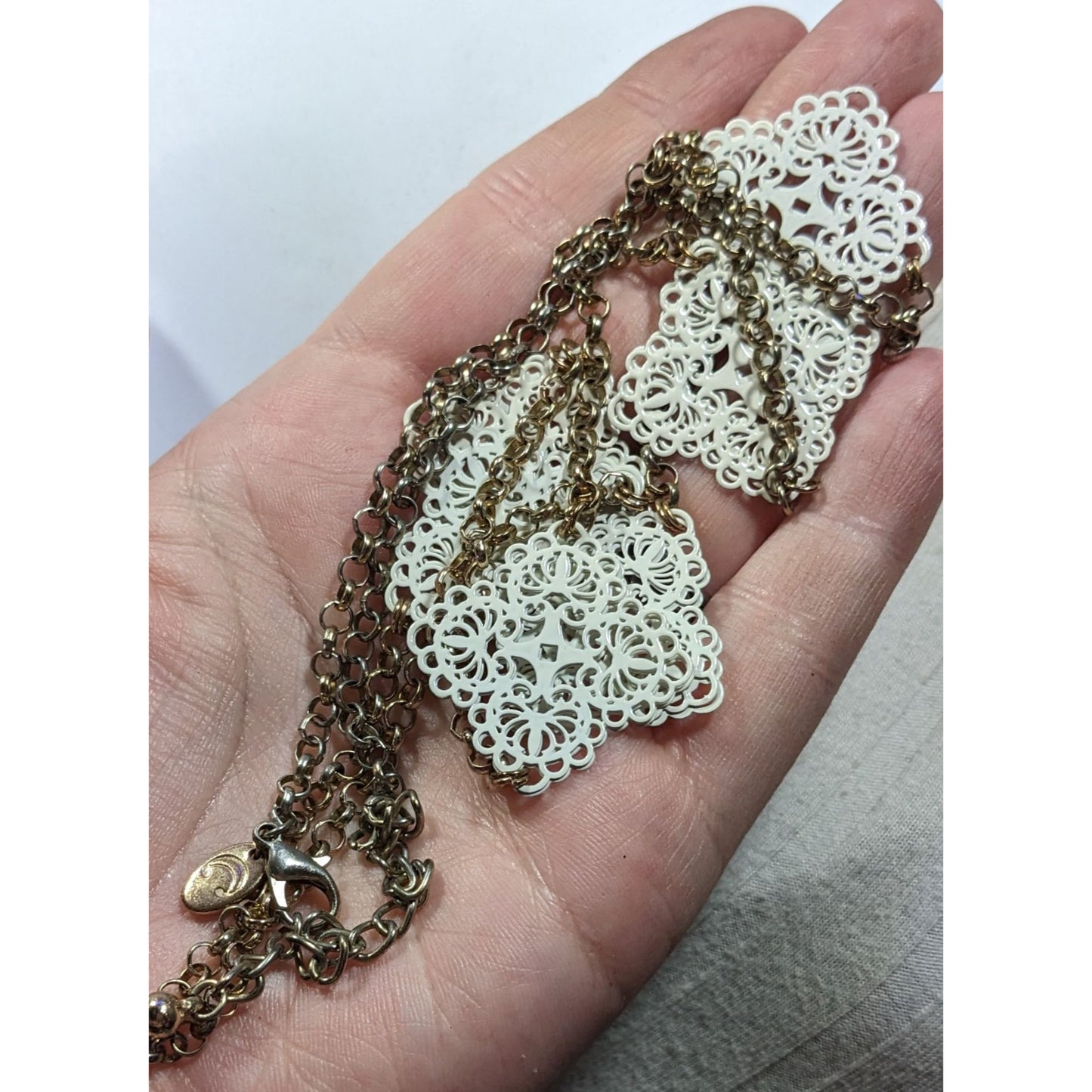 Charming Charlie White And Gold Tone Floral Filigree Station Necklace