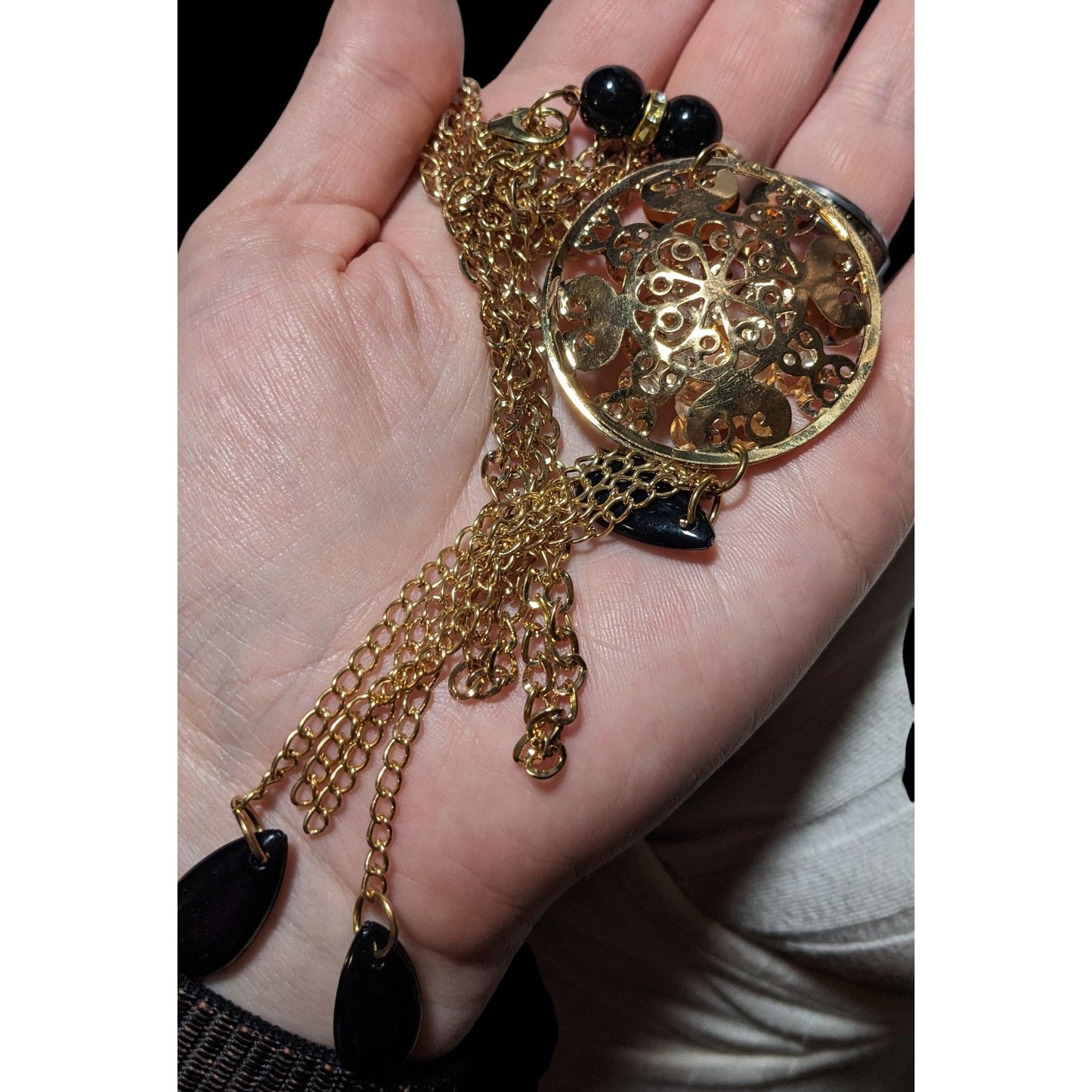 Gold Floral Crystal Filled Pendant Tassel Necklace