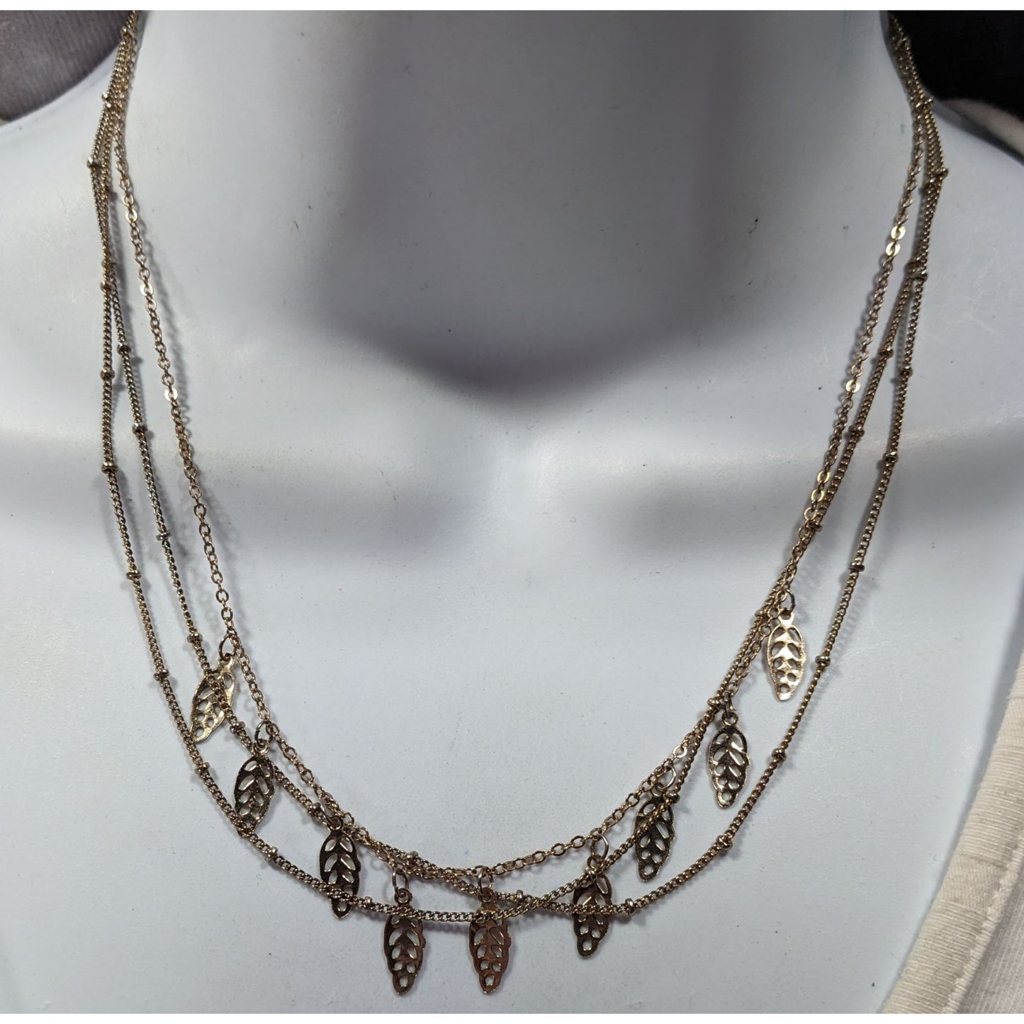 Claires Multilayer Leaf Charm Gold Tone Necklace