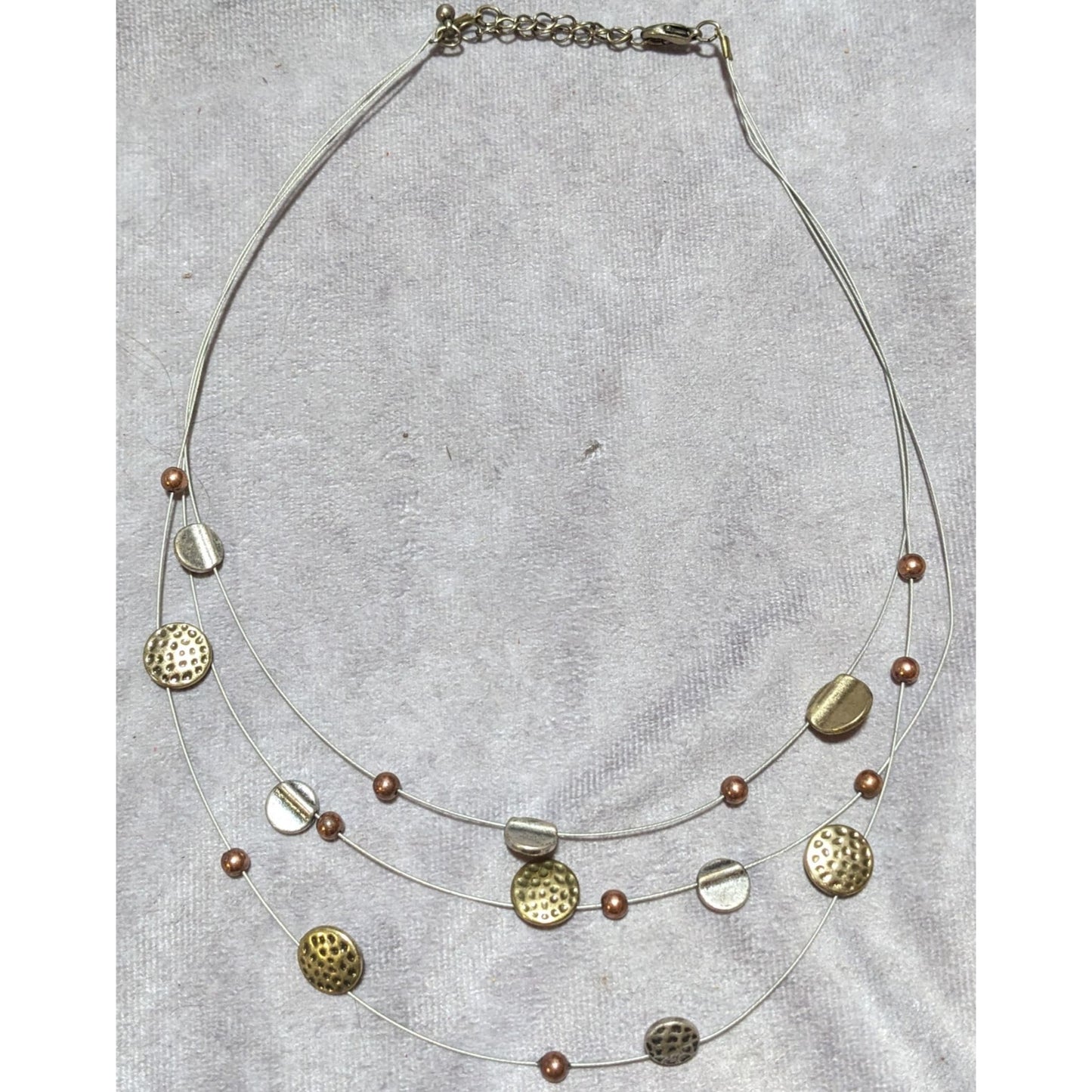 Metallic Disc Floating Necklace.