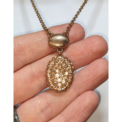 Elegant Monet Rose Gold-Tone Crystal Pendant Necklace With Textured Oval Accent