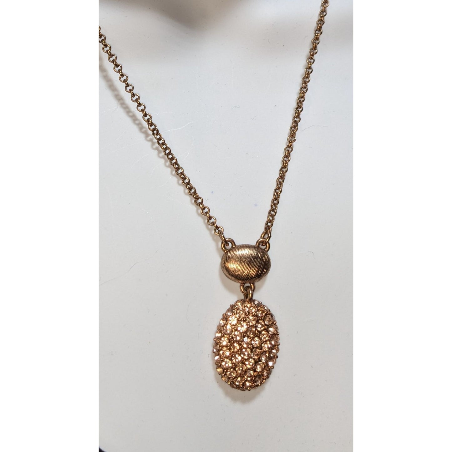 Elegant Monet Rose Gold-Tone Crystal Pendant Necklace With Textured Oval Accent