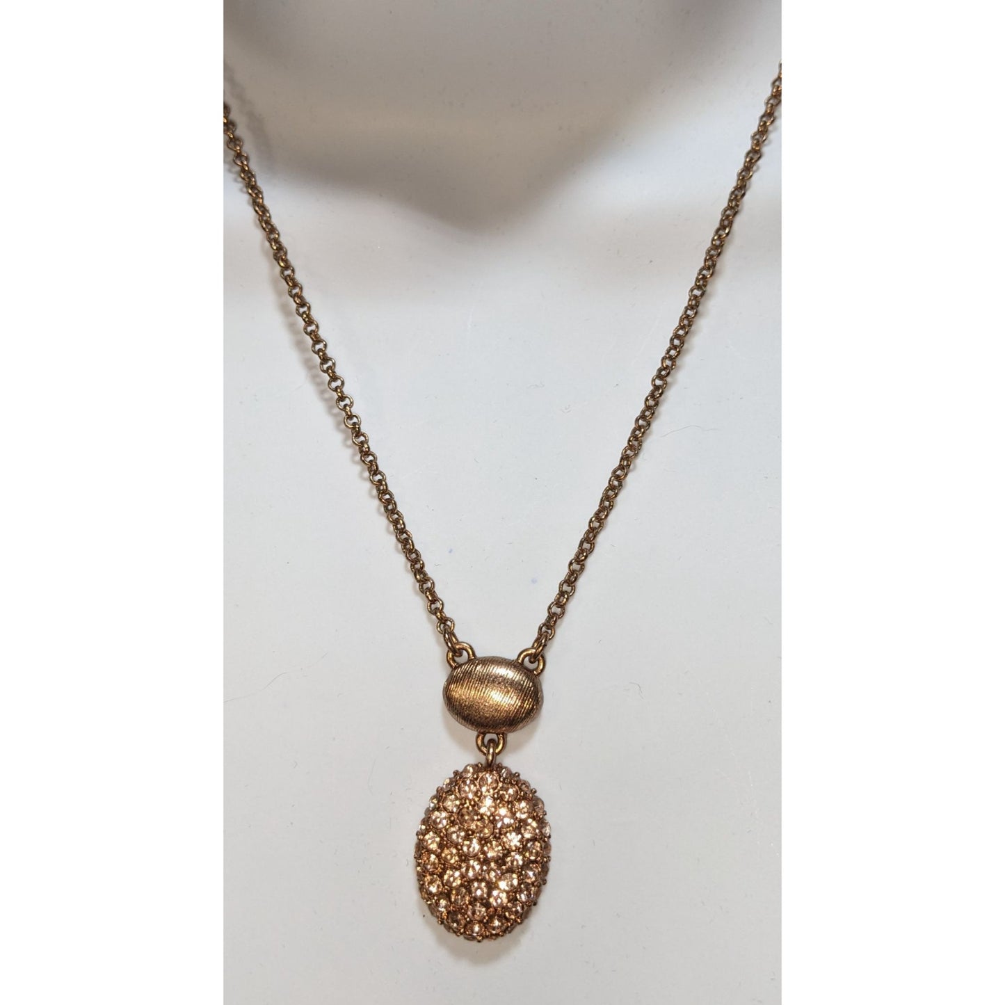 Elegant Monet Rose Gold-Tone Crystal Pendant Necklace With Textured Oval Accent