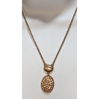 Elegant Monet Rose Gold-Tone Crystal Pendant Necklace With Textured Oval Accent
