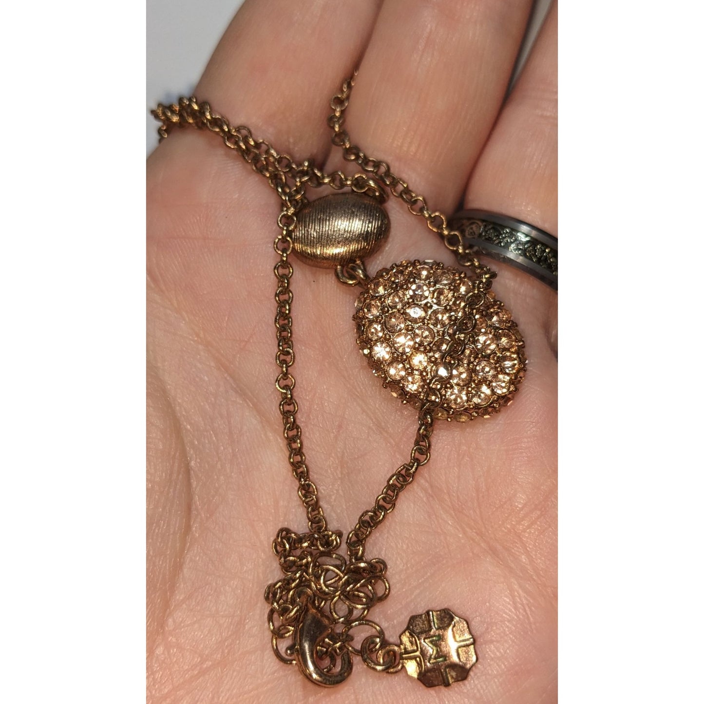 Elegant Monet Rose Gold-Tone Crystal Pendant Necklace With Textured Oval Accent