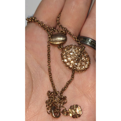 Elegant Monet Rose Gold-Tone Crystal Pendant Necklace With Textured Oval Accent
