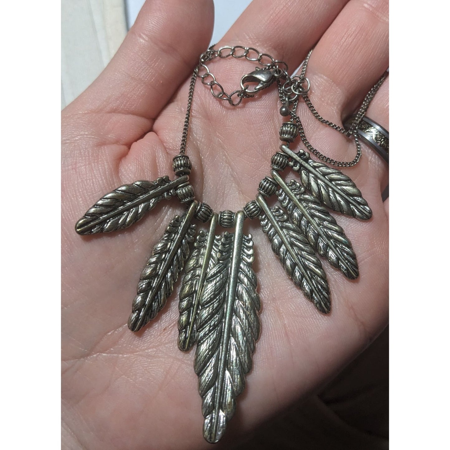 Silver Graduated Feather Charm  Necklace