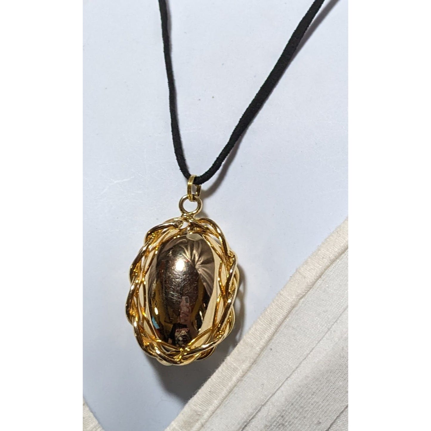 Wrapped Gold Egg Necklace