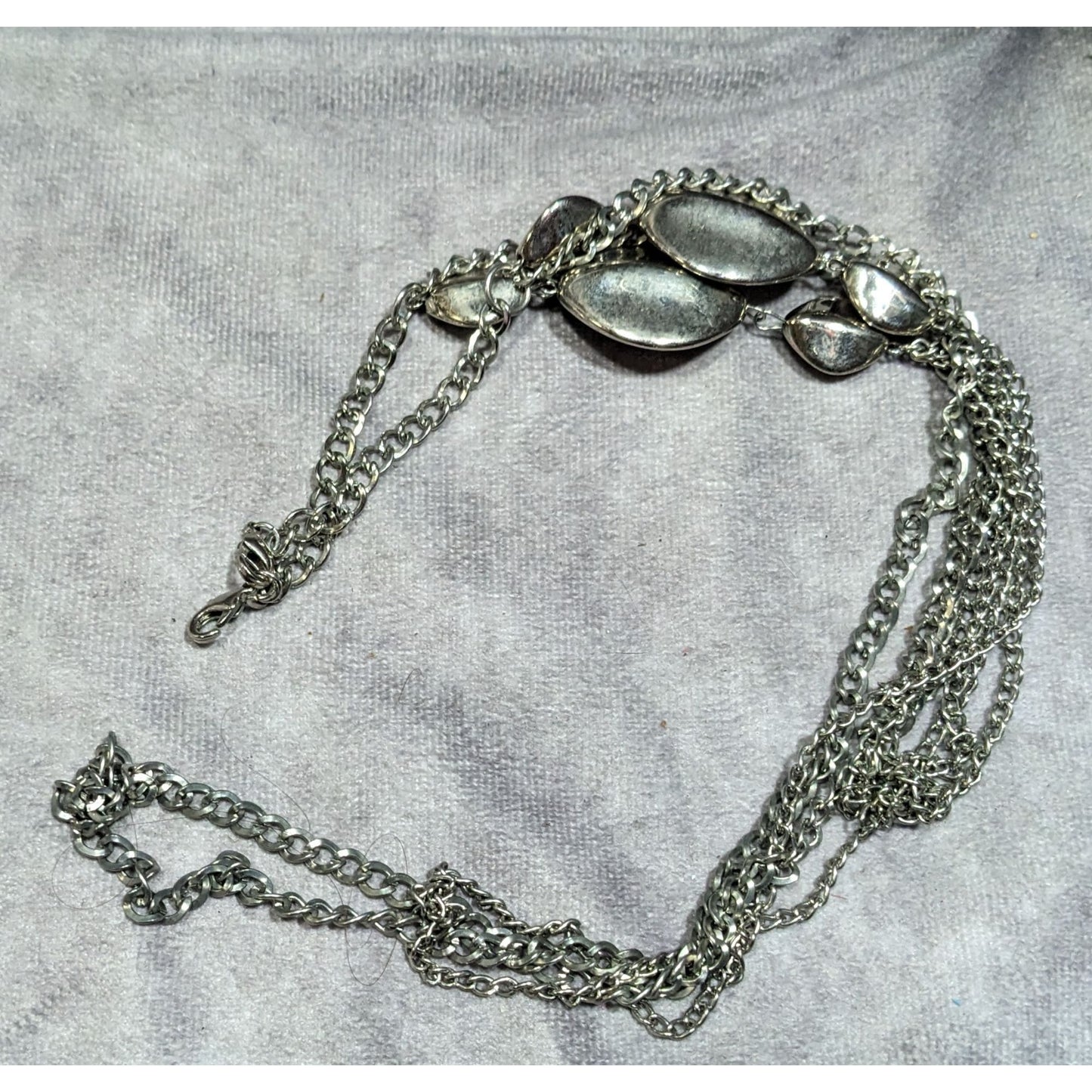 Layered Silver Tone Chain Necklace With Abstract Bead Accents