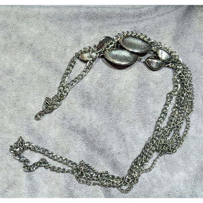 Layered Silver Tone Chain Necklace With Abstract Bead Accents