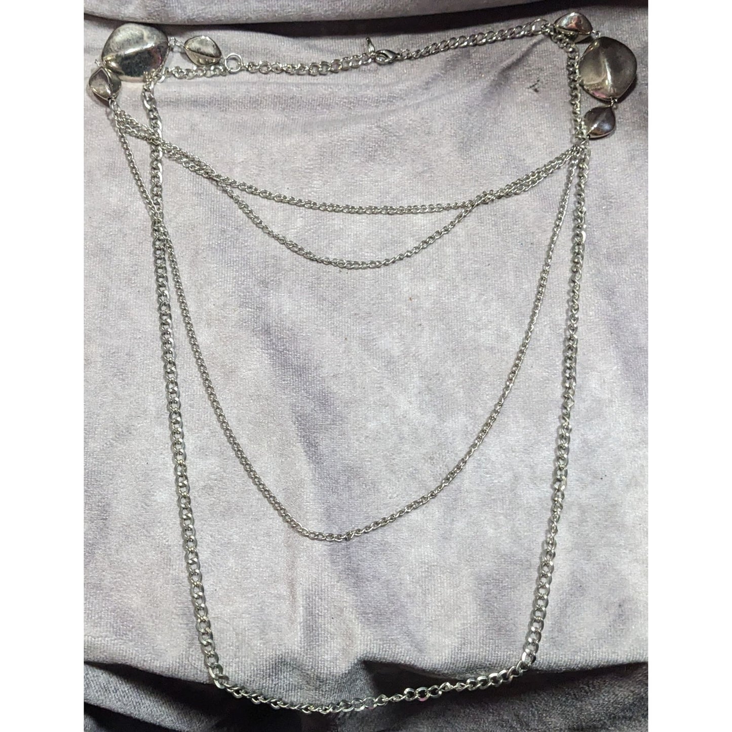 Layered Silver Tone Chain Necklace With Abstract Bead Accents
