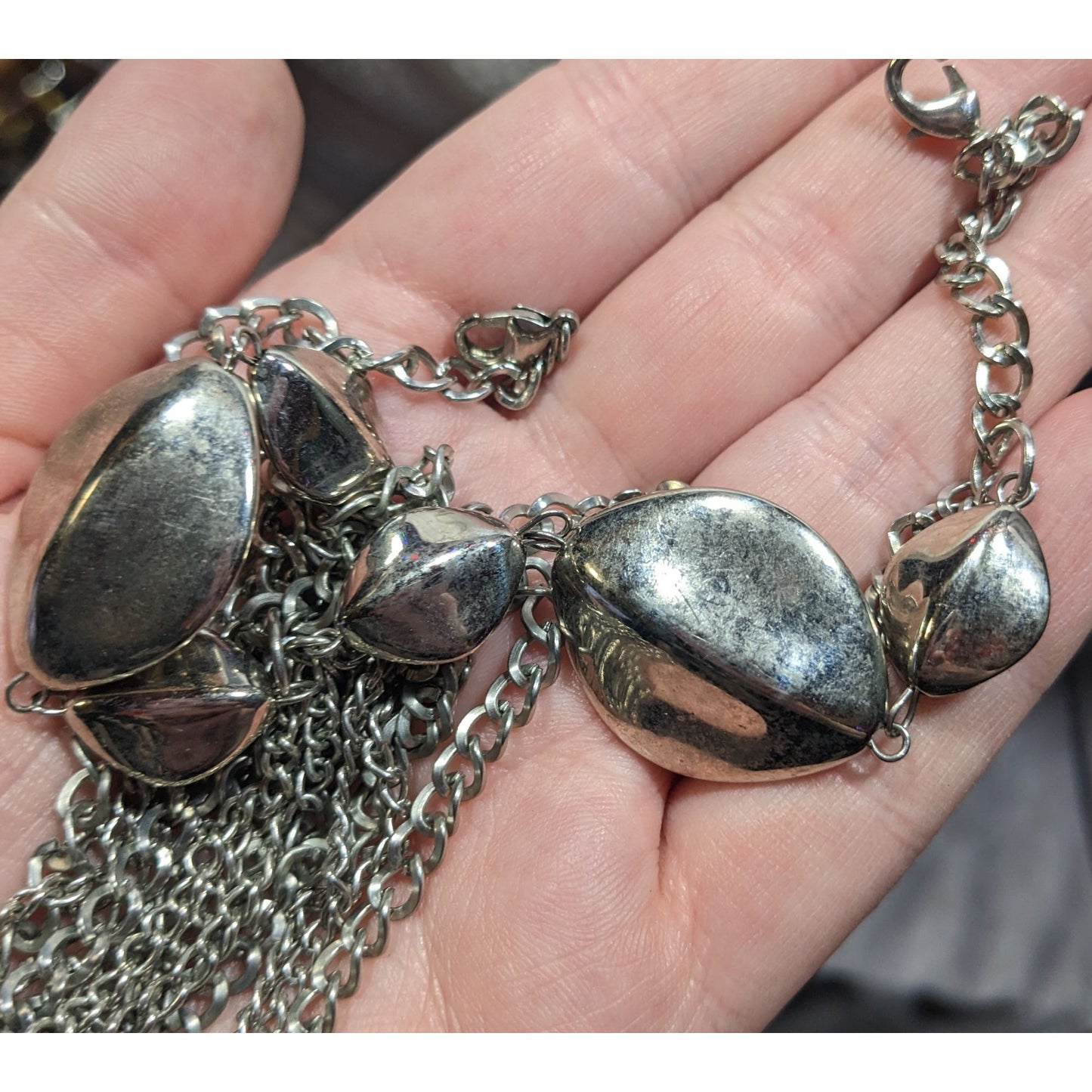 Layered Silver Tone Chain Necklace With Abstract Bead Accents