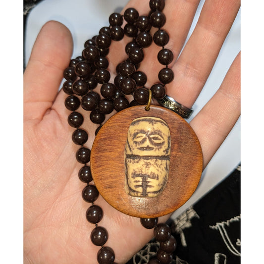 Hand-Carved Wooden Beaded Necklace With Tribal-Inspired Pendant