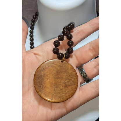 Hand-Carved Wooden Beaded Necklace With Tribal-Inspired Pendant