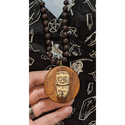 Hand-Carved Wooden Beaded Necklace With Tribal-Inspired Pendant