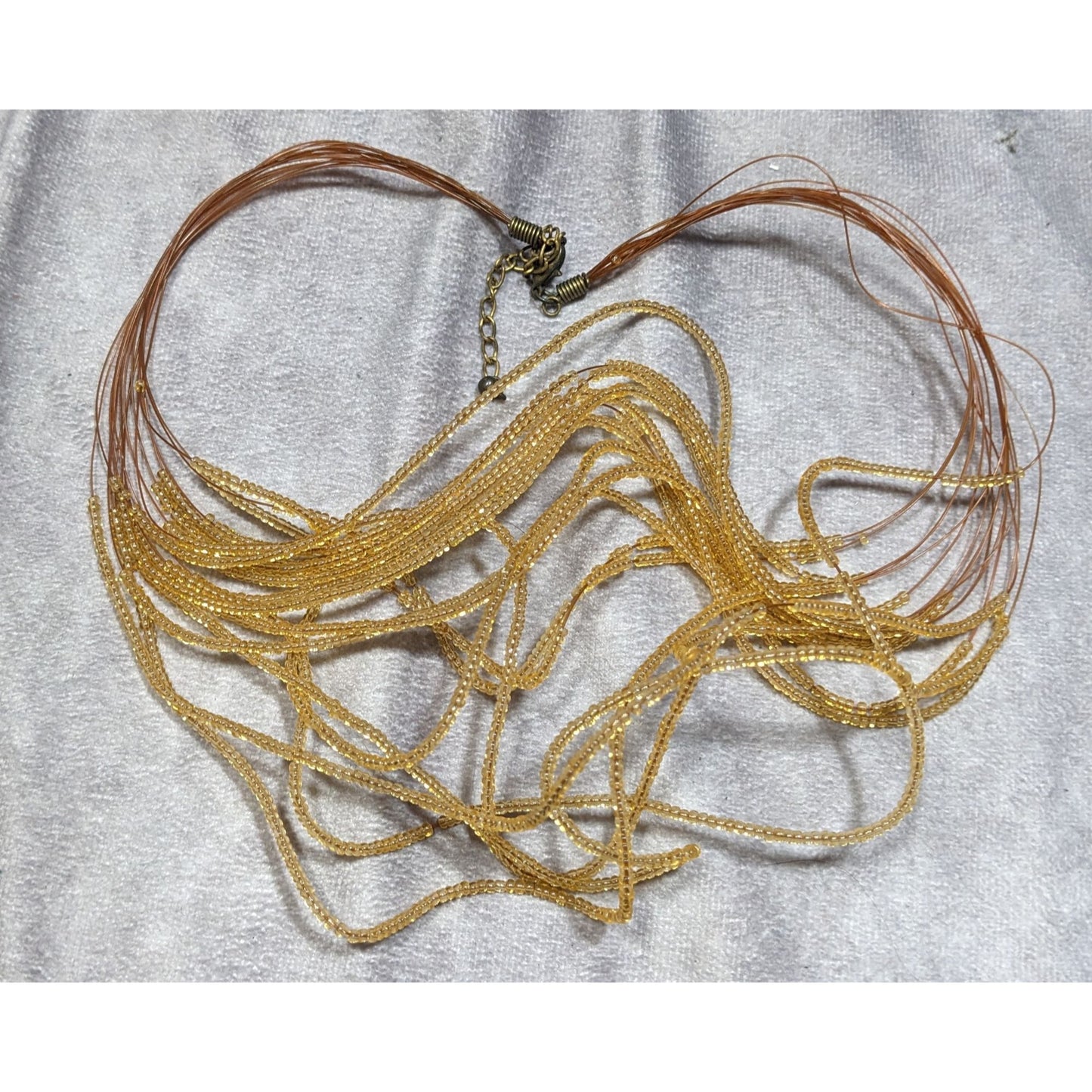 Golden Glass Multi-Strand Beaded Necklace On Copper Tone Beading Wire