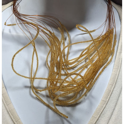 Golden Glass Multi-Strand Beaded Necklace On Copper Tone Beading Wire