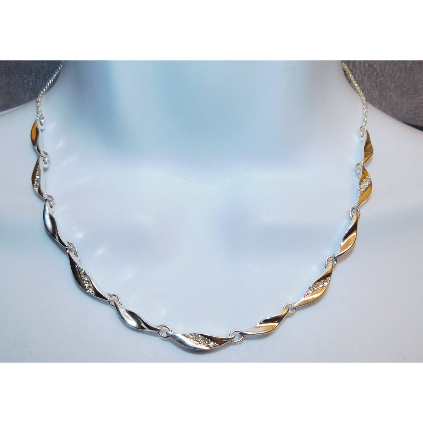 Rhinestone Twisted Leaf Link Necklace With Rhinestone Accents And Pearl Back