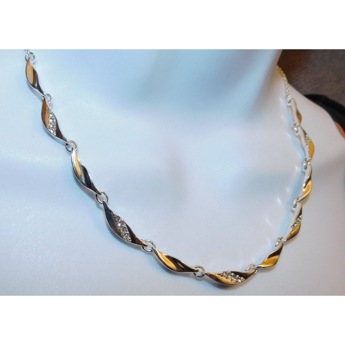 Rhinestone Twisted Leaf Link Necklace With Rhinestone Accents And Pearl Back