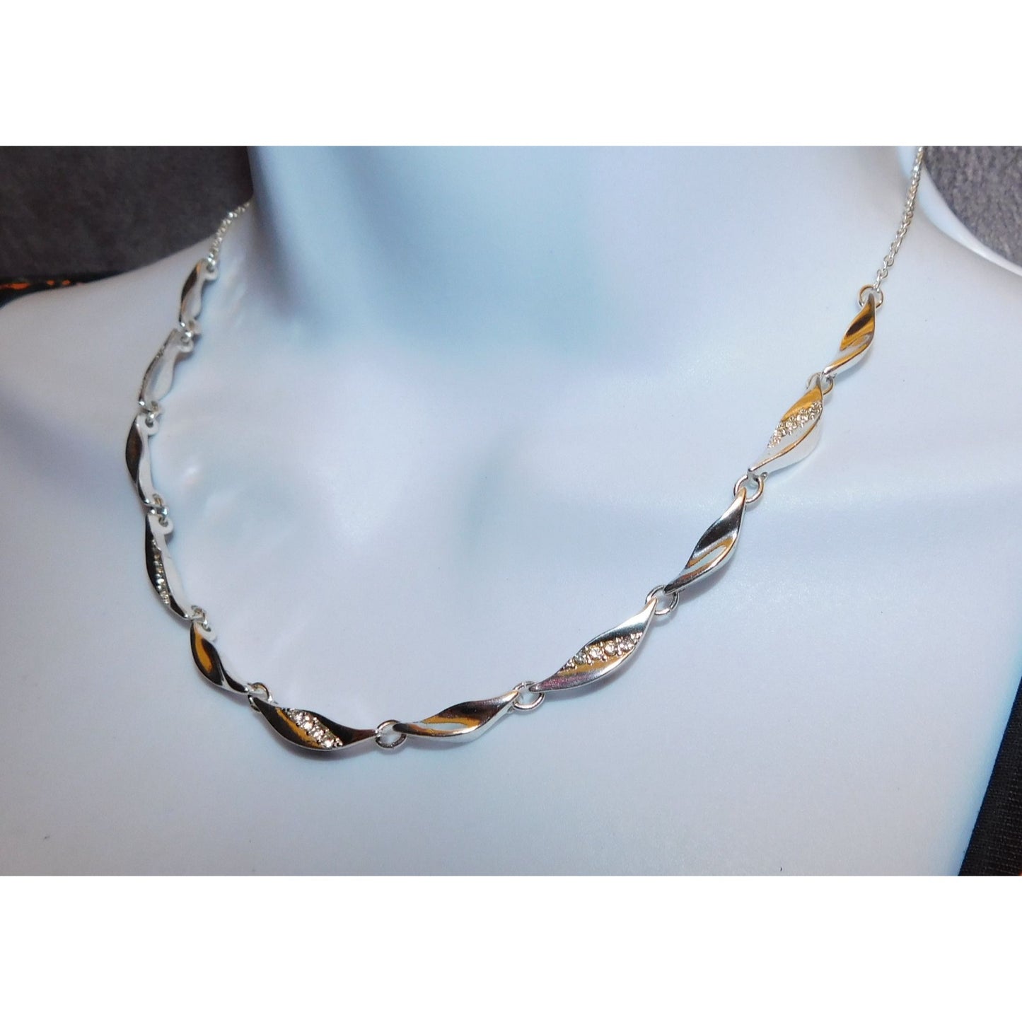 Rhinestone Twisted Leaf Link Necklace With Rhinestone Accents And Pearl Back