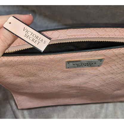 Victorias Secret Light Pink Faux Leather Snake Textured Zip Top Clutch With Tassel Accent