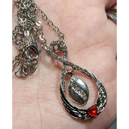 Heart And Wing Silver Tone Pendant Necklace With Clear And Red Gems