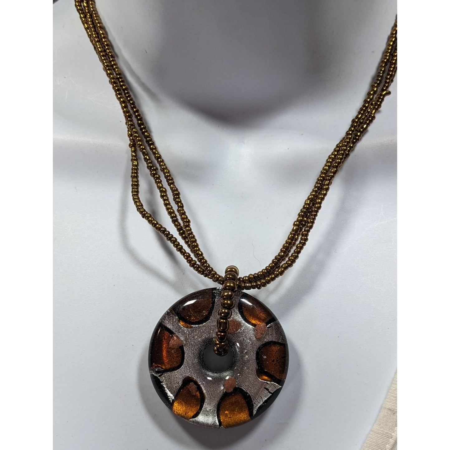 Metallic Glass Donut Pendant Necklace Silver And Gold Tone With Gold Glass Seed Beads