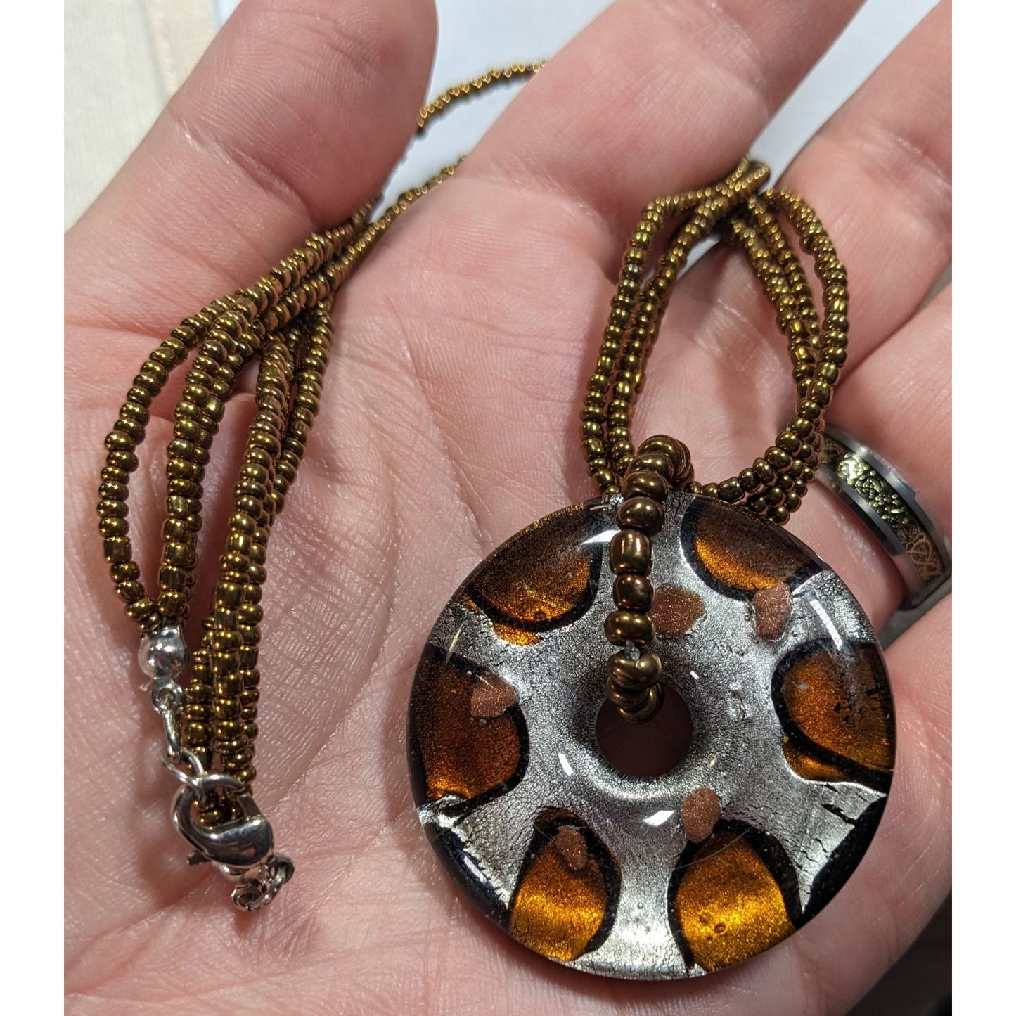 Metallic Glass Donut Pendant Necklace Silver And Gold Tone With Gold Glass Seed Beads