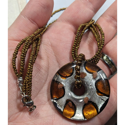 Metallic Glass Donut Pendant Necklace Silver And Gold Tone With Gold Glass Seed Beads