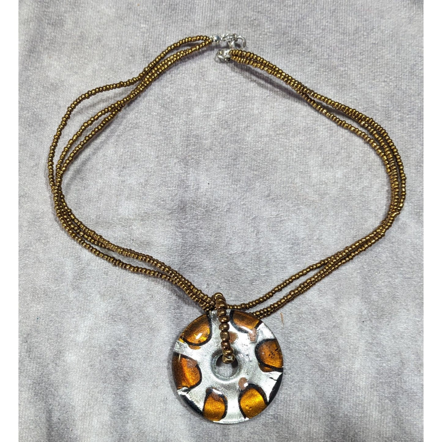 Metallic Glass Donut Pendant Necklace Silver And Gold Tone With Gold Glass Seed Beads