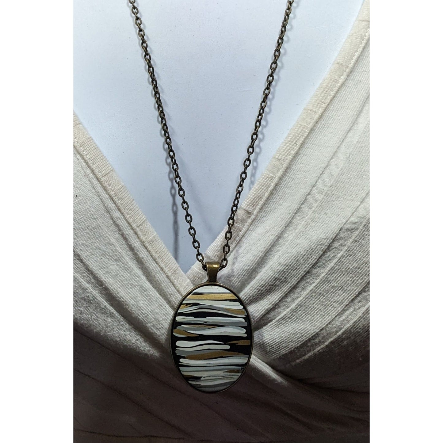 Hand Painted Striped Black White And Gold Tone Pendant Necklace