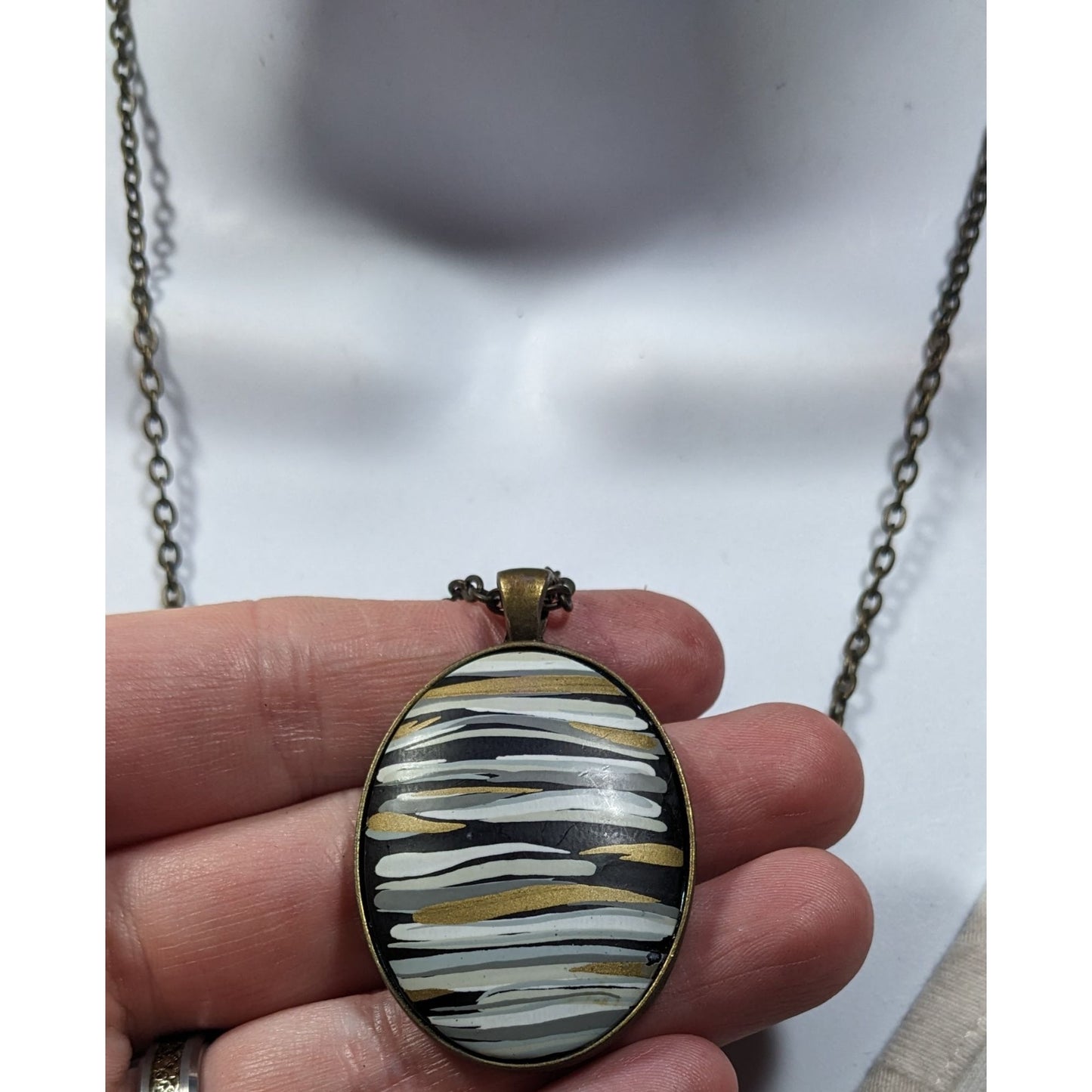 Hand Painted Striped Black White And Gold Tone Pendant Necklace