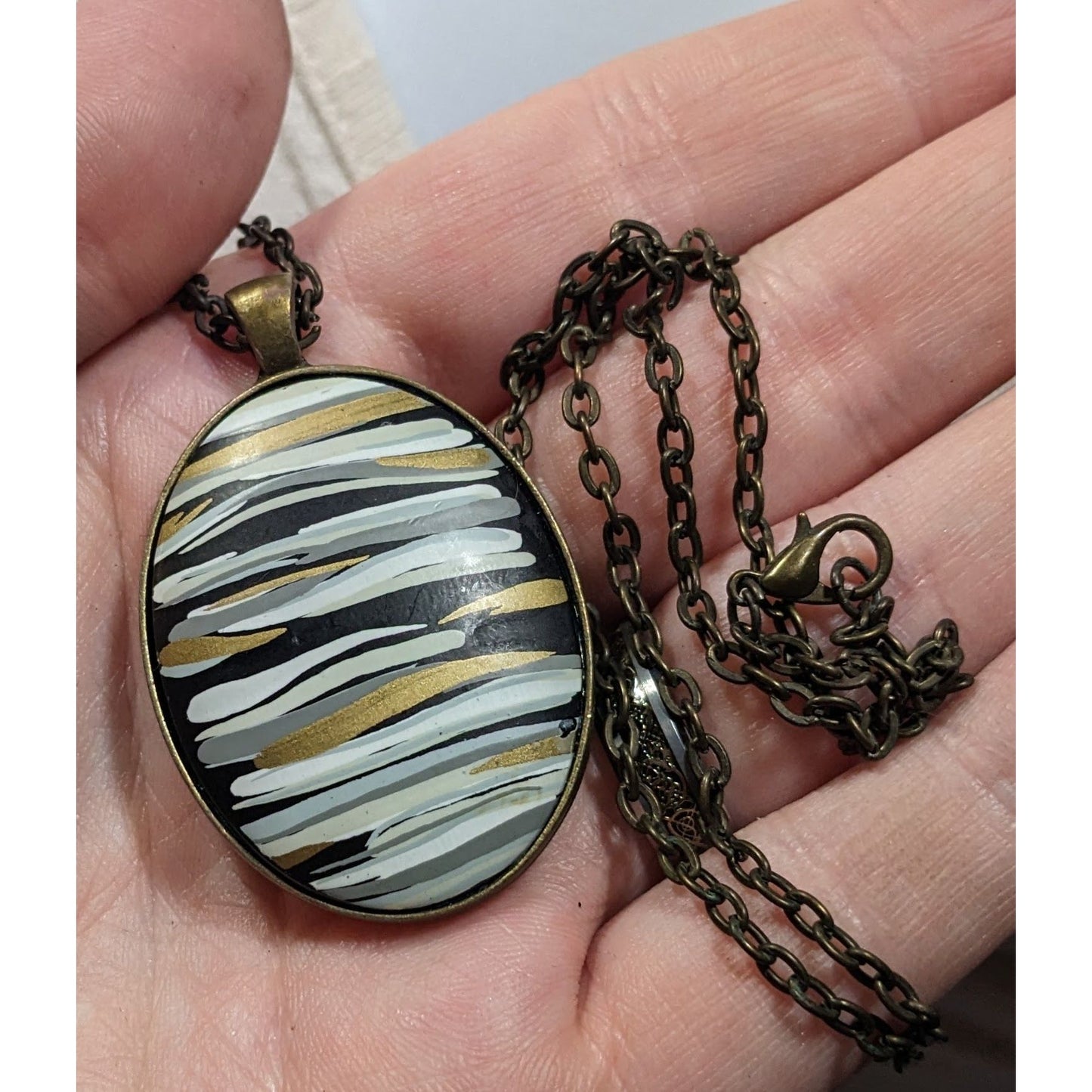 Hand Painted Striped Black White And Gold Tone Pendant Necklace