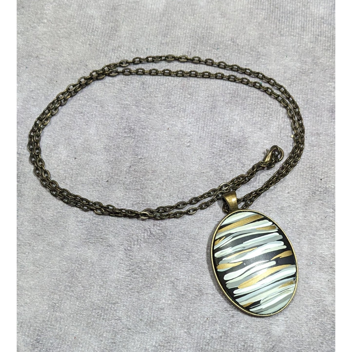 Hand Painted Striped Black White And Gold Tone Pendant Necklace