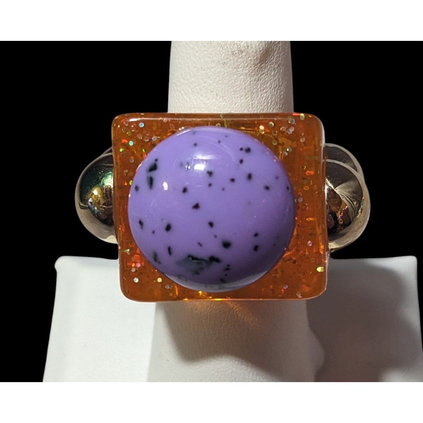 Chunky Translucent Orange Glitter Ring With Gold And Purple Accents