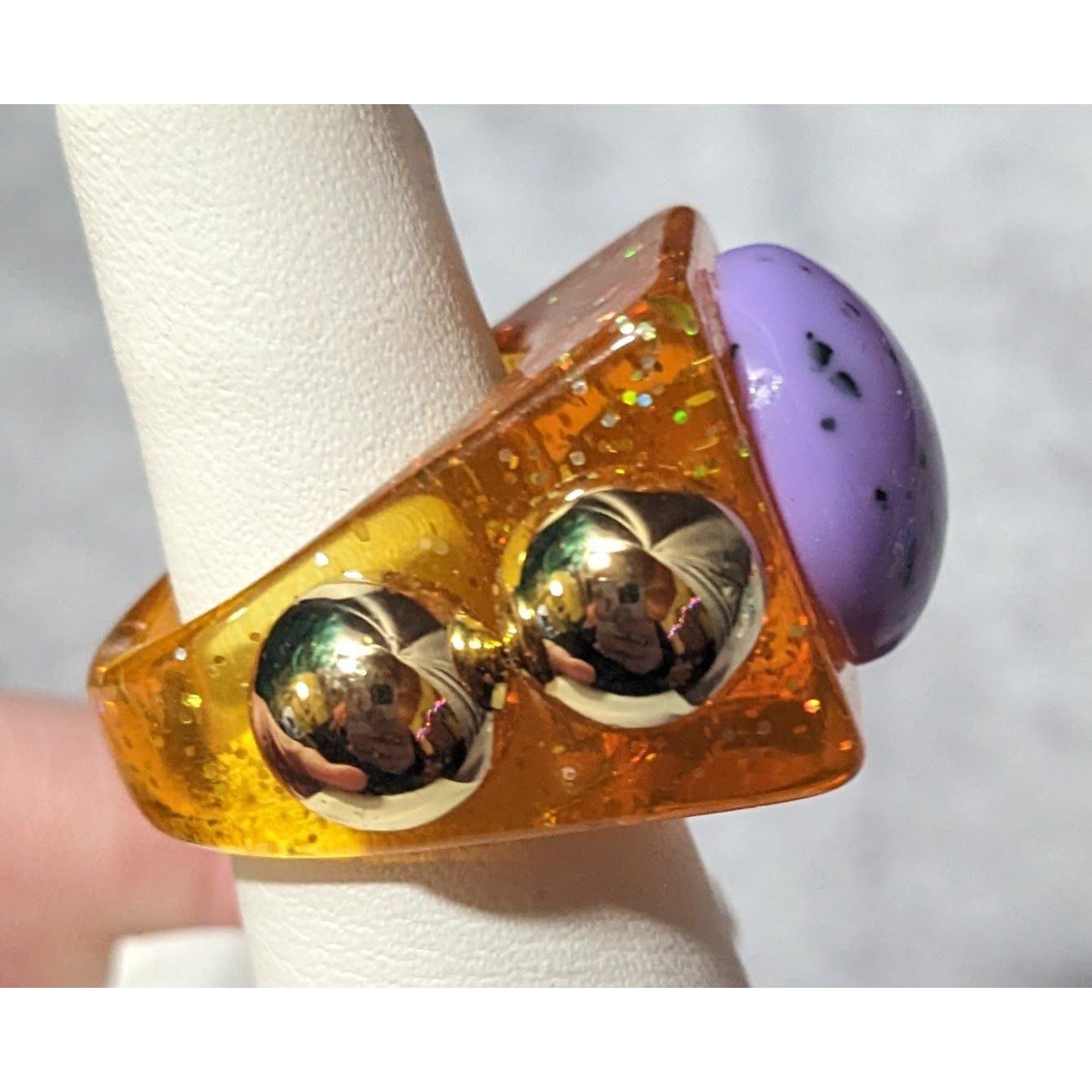 Chunky Translucent Orange Glitter Ring With Gold And Purple Accents