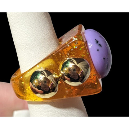 Chunky Translucent Orange Glitter Ring With Gold And Purple Accents