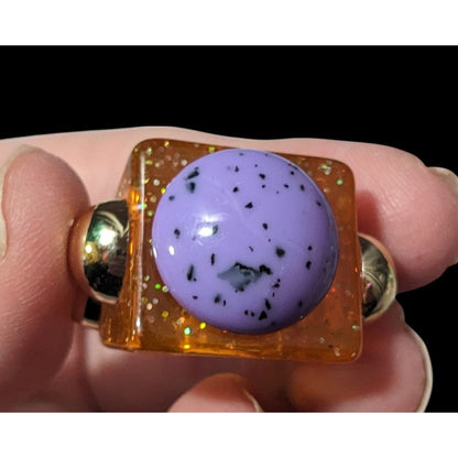 Chunky Translucent Orange Glitter Ring With Gold And Purple Accents