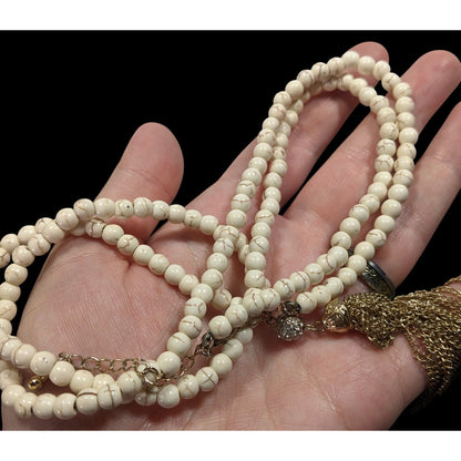 Boho Chic Howlite Beaded Necklace With Gold Tone Tassel And Rhinestone Accents
