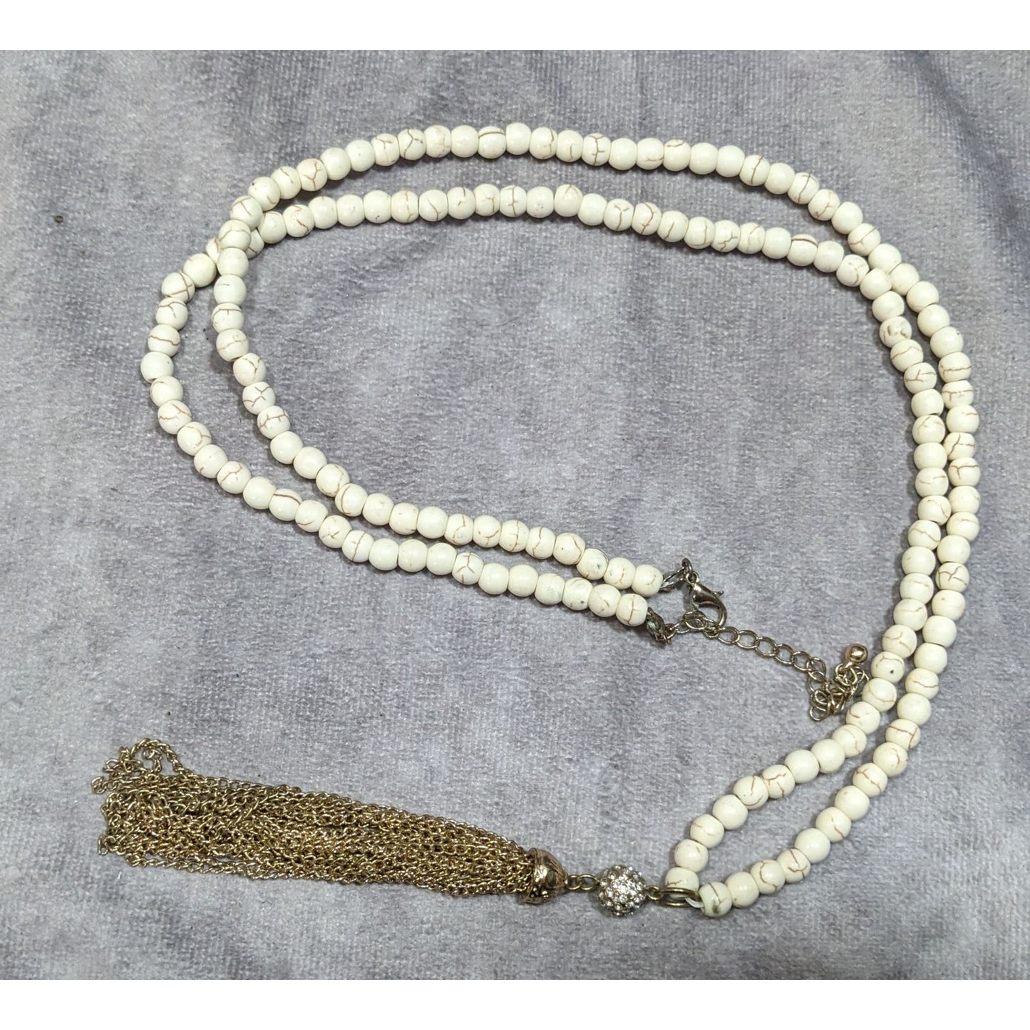 Boho Chic Howlite Beaded Necklace With Gold Tone Tassel And Rhinestone Accents