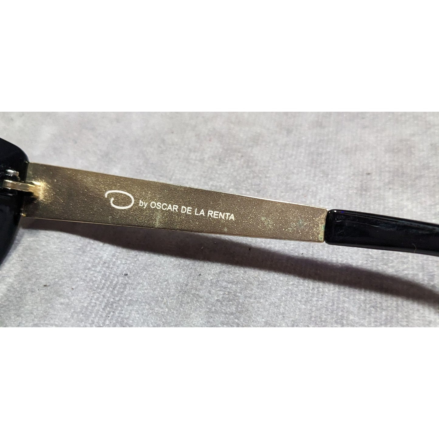 Oscar De La Renta Black And Gold Tone Sunglasses With Purple Lenses