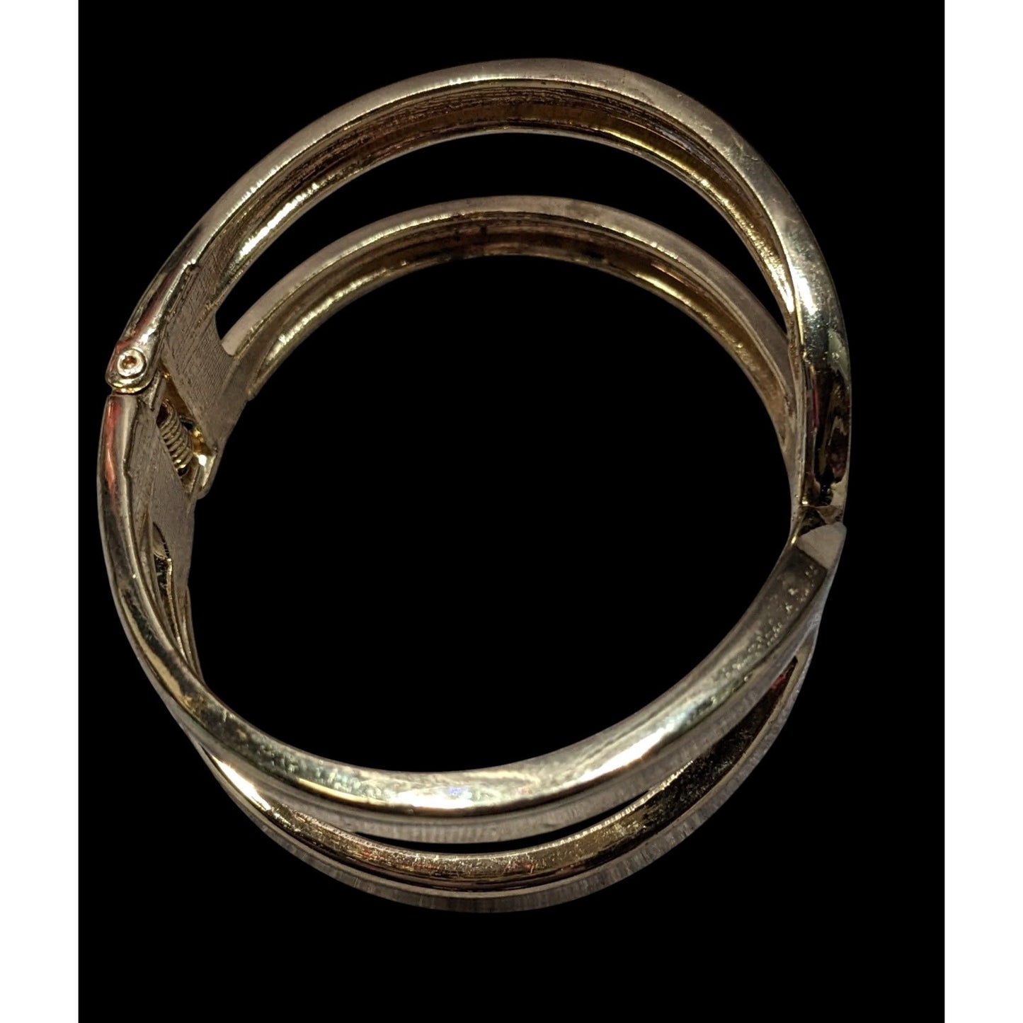 Gold-Tone Hinged Bangle Bracelet With Openwork Design