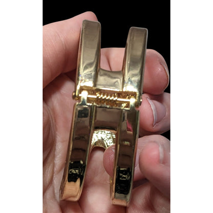 Gold-Tone Hinged Bangle Bracelet With Openwork Design