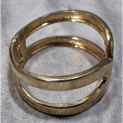 Gold-Tone Hinged Bangle Bracelet With Openwork Design