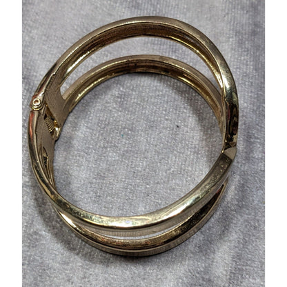 Gold-Tone Hinged Bangle Bracelet With Openwork Design