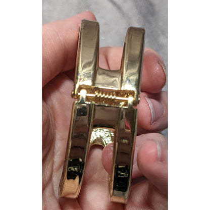 Gold-Tone Hinged Bangle Bracelet With Openwork Design