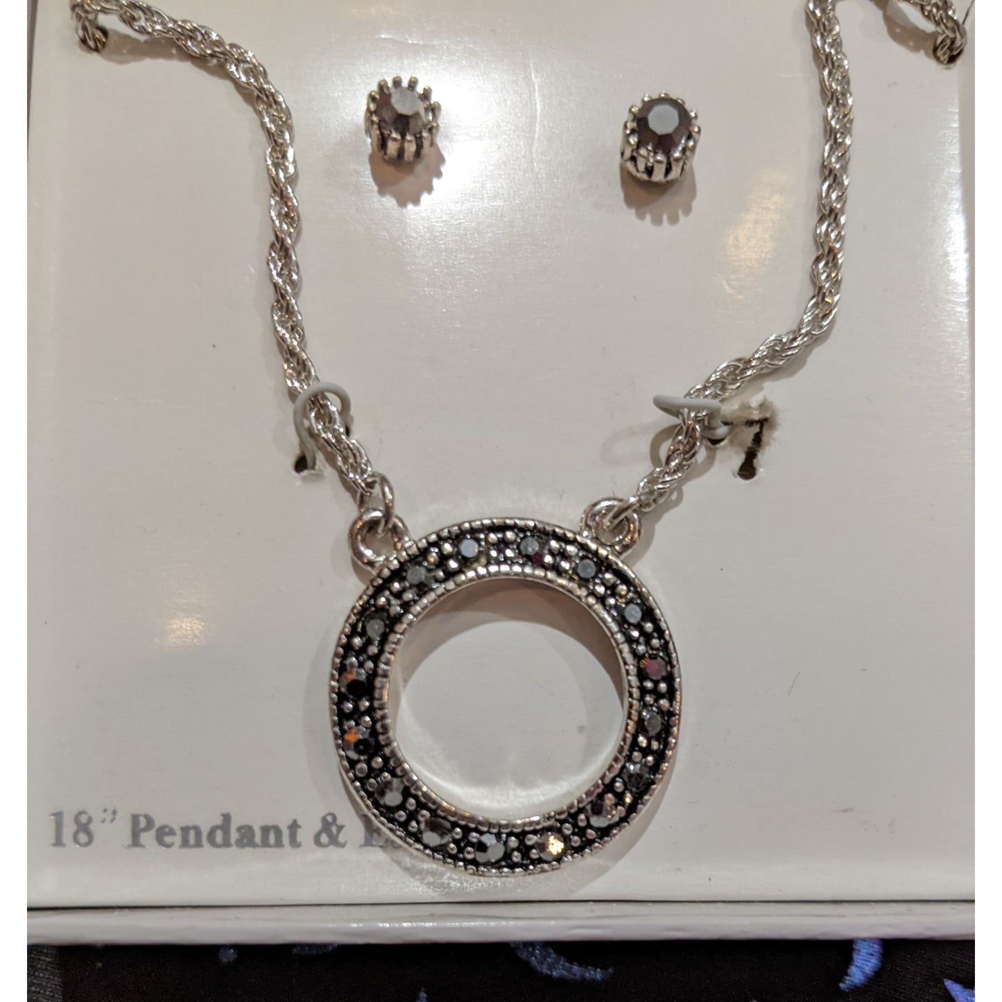 Black And Silver Tone Open Circle Pendant With Matching Stud Earrings